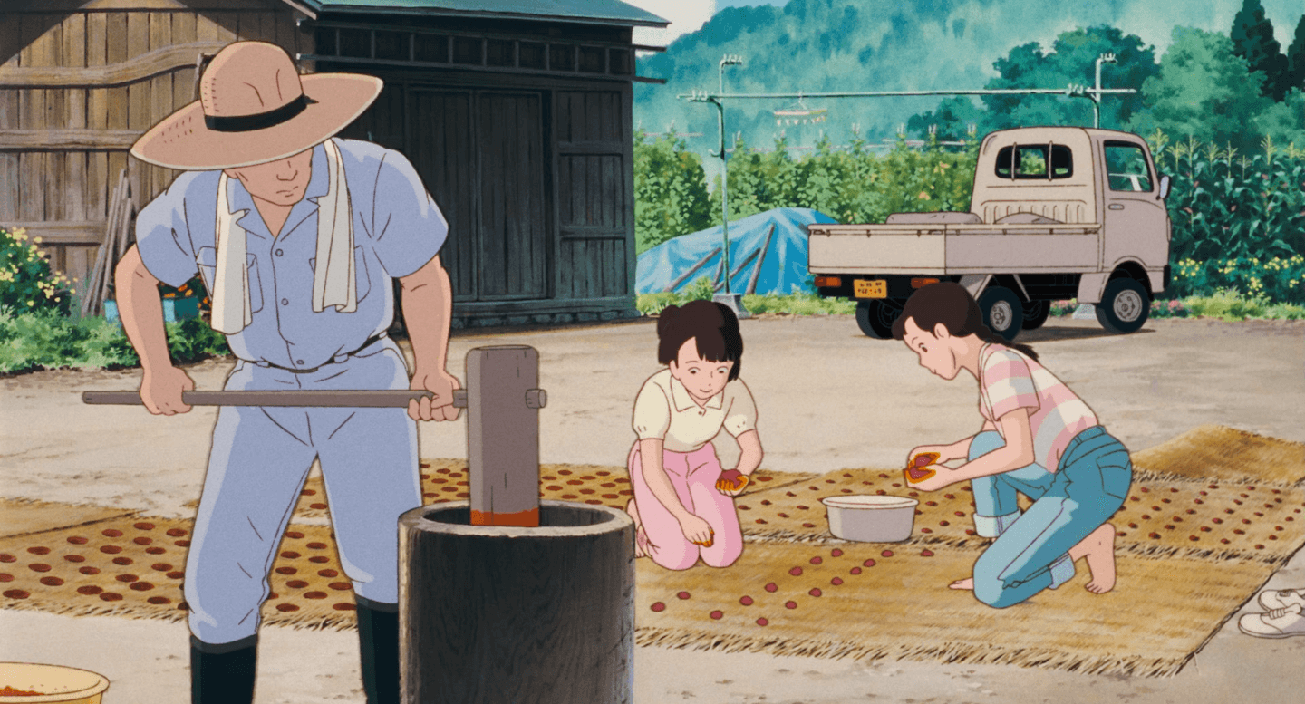 Image of Taeko laying out saffron on straw mats